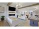 Sun-filled living room with modern fireplace, hardwood floors, and stylish decor at 701 Smith St, Atlanta, GA 30310
