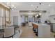 Open concept living area with modern dining, kitchen, and stainless steel appliances at 701 Smith St, Atlanta, GA 30310