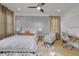 Inviting primary bedroom featuring a decorative accent wall and cozy seating area at 701 Smith St, Atlanta, GA 30310