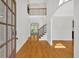 Bright foyer with hardwood floors, a staircase with iron railings, and an open view to the upper level at 120 Generals Pl, Canton, GA 30114