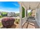 Inviting front porch with a porch swing, supported by white columns, with a view of the neighborhood at 120 Generals Pl, Canton, GA 30114