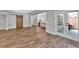 Open living area with access to the kitchen and a door to the patio at 120 Generals Pl, Canton, GA 30114