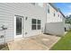Outdoor space featuring a concrete patio, white siding, and a fenced in backyard at 235 Centennial Cir, Canton, GA 30114