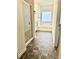 Elegant bathroom featuring a glass shower, soaking tub, and decorative window, creating a luxurious retreat at 235 Centennial Cir, Canton, GA 30114