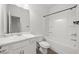 Pristine bathroom with a marble vanity top and a shower-tub combo with a black rod at 235 Centennial Cir, Canton, GA 30114