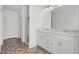 Bathroom featuring double vanity, glass shower, and tiled floors at 235 Centennial Cir, Canton, GA 30114