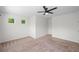 Another bedroom with neutral carpeting, windows, and white walls at 235 Centennial Cir, Canton, GA 30114