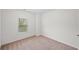 Comfortable bedroom with neutral carpet and a window that provides natural light at 235 Centennial Cir, Canton, GA 30114