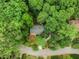 Aerial view of a house nestled among many tall green trees at 2361 Woodward Nw Way, Atlanta, GA 30305