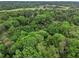 Tranquil aerial shot of a home surrounded by a canopy of verdant trees at 2361 Woodward Nw Way, Atlanta, GA 30305