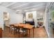 Open concept dining room with a view of the kitchen and living area at 2361 Woodward Nw Way, Atlanta, GA 30305