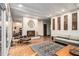Spacious living room features a fireplace and opens to the dining area, perfect for entertaining at 2361 Woodward Nw Way, Atlanta, GA 30305
