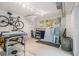 Bright, open space with a bicycle, work table, and art supplies, perfect for creative hobbies at 2361 Woodward Nw Way, Atlanta, GA 30305