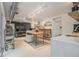 Versatile open space with track lighting, kitchenette, and storage, ideal for various uses at 2361 Woodward Nw Way, Atlanta, GA 30305