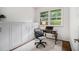 Office space with built-in cabinets and a window at 2361 Woodward Nw Way, Atlanta, GA 30305