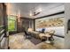 Stylish outdoor patio area with comfortable seating, ceiling fan, and string lights at 2361 Woodward Nw Way, Atlanta, GA 30305