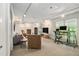 Spacious living area with built-in bookshelves, lots of windows, and stylish furniture at 2361 Woodward Nw Way, Atlanta, GA 30305