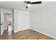 Bedroom featuring wood floors and a closet with bi-fold doors at 3344 Northcrest Rd # A, Atlanta, GA 30340