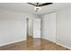 The bedroom has modern ceiling fan, laminate flooring, and a walk in closet at 3344 Northcrest Rd # A, Atlanta, GA 30340
