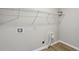 Functional laundry room with washer/dryer hookups and shelving at 3344 Northcrest Rd # A, Atlanta, GA 30340