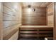 Relaxing sauna with wooden walls, benches, and a temperature gauge at 3344 Northcrest Rd # A, Atlanta, GA 30340