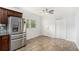 Bright dining area with stainless steel refrigerator, tile flooring, and ample natural light at 3378 Lavista Dr, Atlanta, GA 30354