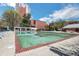 Large outdoor swimming pool with lounge chairs and umbrellas provides a relaxing atmosphere at 375 Ralph Mcgill Blvd # 1503, Atlanta, GA 30312