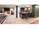 Stylish finished basement with bar area, lounge space, and gym for entertainment, relaxation, and fitness at 1299 W Wesley Nw Rd, Atlanta, GA 30327