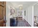 Entry foyer with hardwood floors, Persian rug, a chandelier, and decorative accents at 1299 W Wesley Nw Rd, Atlanta, GA 30327