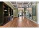 Elegant foyer boasting beautiful hardwood floors, coffered ceilings, and a decorative mirror wall at 2111 Democracy Dr, Buford, GA 30519
