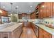 Gourmet kitchen with granite countertops, island seating, and stainless steel appliances at 2111 Democracy Dr, Buford, GA 30519