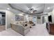 Cozy living room with recessed lighting, neutral carpet, and easy access to the kitchenette at 2111 Democracy Dr, Buford, GA 30519