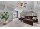 Comfortable seating beneath coffered ceilings create a relaxing space with natural light at 2111 Democracy Dr, Buford, GA 30519
