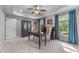 Spacious office offers neutral tones, multiple windows, and ample space for productivity at 2111 Democracy Dr, Buford, GA 30519
