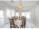 Charming breakfast nook featuring a dining table, natural light, and tile floor at 436 Westlake Nw Dr, Marietta, GA 30064