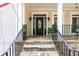 Inviting front entrance with a stone walkway, elegant front door, and charming architectural details at 436 Westlake Nw Dr, Marietta, GA 30064