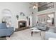 Spacious living room with stone fireplace, vaulted ceiling, and open floor plan at 436 Westlake Nw Dr, Marietta, GA 30064