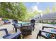 Inviting backyard pool area with comfortable lounge seating and a cozy fire pit at 436 Westlake Nw Dr, Marietta, GA 30064