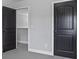 Bedroom featuring paneled doors, one leading to a walk-in closet at 1205 Campbell Ridge Ln, Lawrenceville, GA 30045
