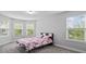 Bright bedroom features multiple windows and neutral paint colors at 1205 Campbell Ridge Ln, Lawrenceville, GA 30045