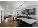 Bright kitchen with stainless appliances, granite counters, dark cabinets, and breakfast bar at 1205 Campbell Ridge Ln, Lawrenceville, GA 30045