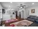 Cozy living room featuring hardwood floors, ceiling fan, neutral paint and an open floor plan at 1205 Campbell Ridge Ln, Lawrenceville, GA 30045
