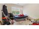 Cluttered bedroom with window at 1520 Ethans Way, Mcdonough, GA 30252
