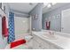 Comfortable bathroom with a shower/tub combo, a single sink, and neutral tones at 2264 Howell Farms Nw Trl, Acworth, GA 30101
