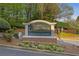 Well-maintained sign for Country Park Condominiums with manicured landscaping at 2308 Country Park Se Dr, Smyrna, GA 30080