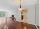 Spacious living room with fireplace, hardwood floors, and an open flow to other rooms at 2308 Country Park Se Dr, Smyrna, GA 30080