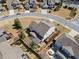 Aerial view of backyard, patio cover, and surrounding neighborhood at 441 Spring View Dr, Woodstock, GA 30188