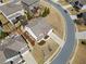 Aerial view of the house showing the roof, driveway, and landscaping at 441 Spring View Dr, Woodstock, GA 30188