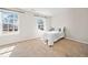 Bright bedroom featuring neutral walls, carpet flooring, and large windows at 441 Spring View Dr, Woodstock, GA 30188