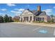 Community clubhouse with ample parking, wheelchair accessibility, and brick accents at 441 Spring View Dr, Woodstock, GA 30188